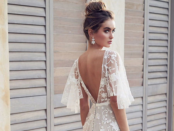 Vestido de noiva com decote nas costas: dicas para arrasar com o modelo