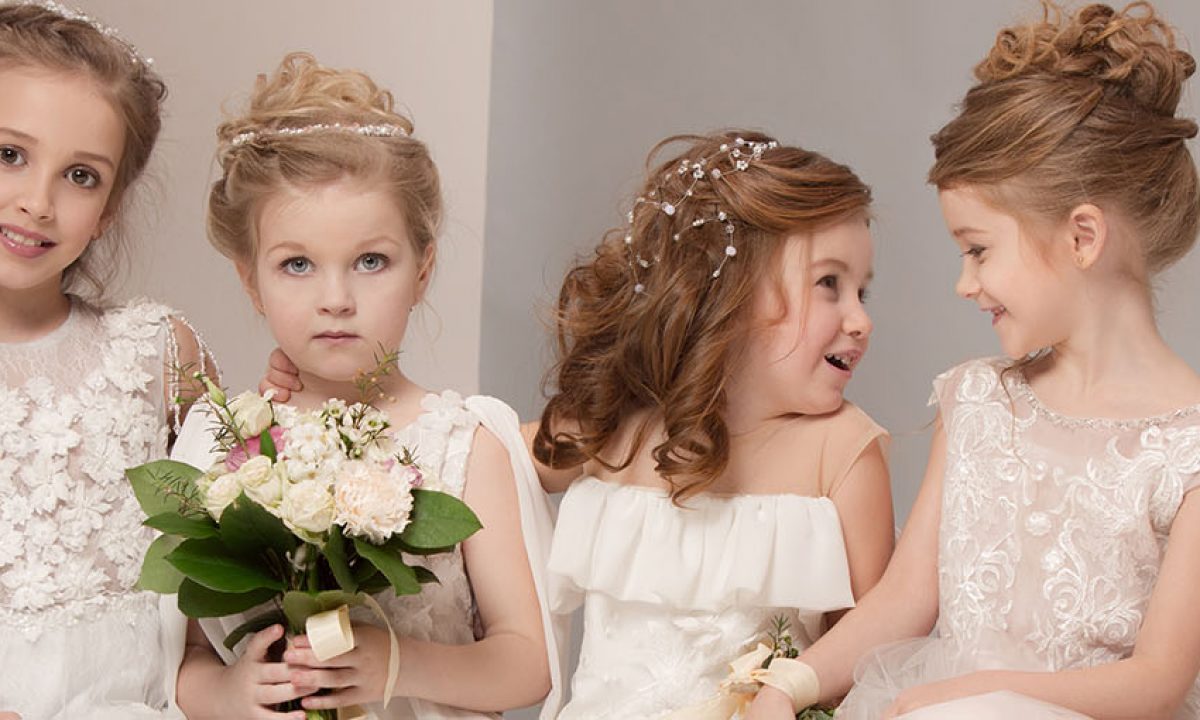 O penteado para daminha de casamento ideal para cada idade